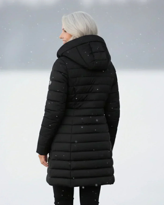 Doudoune femme longue noire matelassée, vue de dos avec capuche