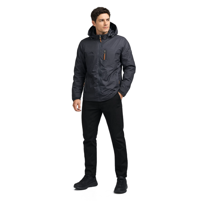 Homme portant le coupe-vent imperméable Le Guéret en gris anthracite