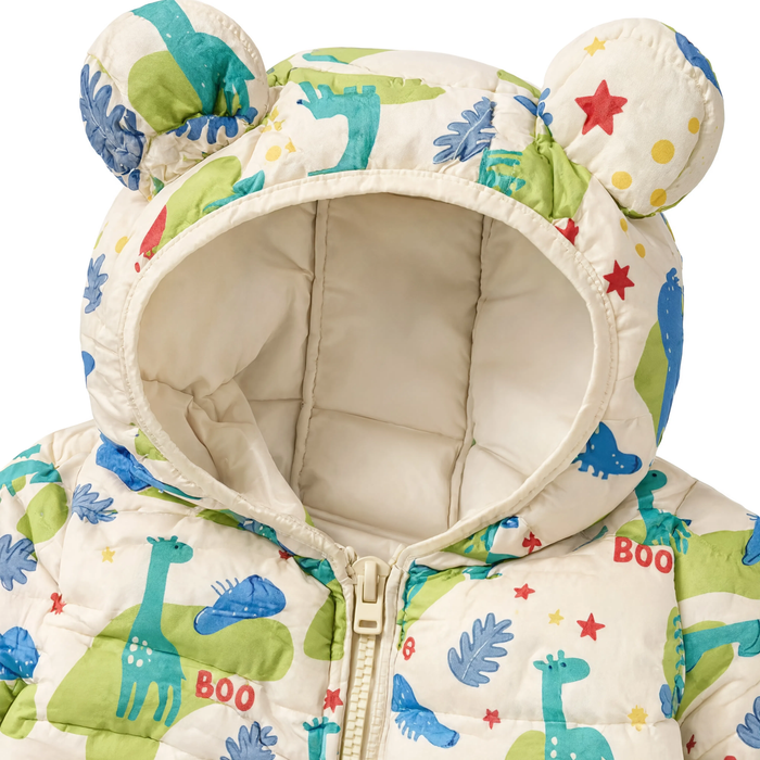 Gros plan sur le col et la capuche de la parka enfant beige dinosaure